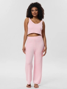 Close-up of soft pink fleece pajama set featuring a crop tank top and wide-leg trousers