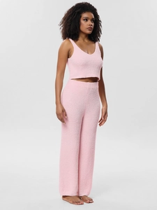 Detailed texture of pink plush two-piece loungewear with V-neck camisole and wide-leg pants