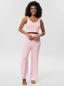 Detailed view of pink plush loungewear set with V-neck vest and wide-leg trousers