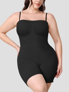 Detail showing high-elasticity fabric and tummy control shaping of the black bodysuit
