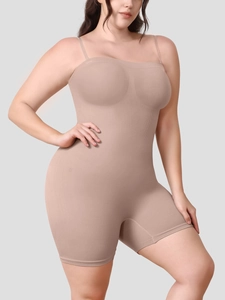 Detail of nude seamless shapewear bodysuit showing tummy control and sculpting texture