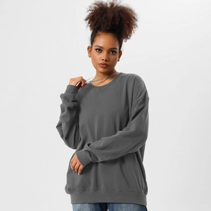 Detail of ribbed cuffs and collar on a heavy cotton oversized dark grey sweatshirt