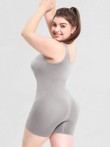 Detail view of seamless light grey shapewear with tummy control and butt lifting texture
