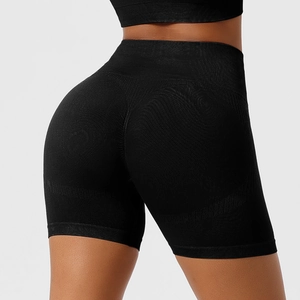 Close-up back view of high-waisted seamless black yoga shorts with push-up effect
