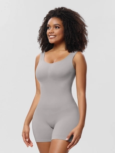 Detail of dark grey seamless bodysuit showing the elastic fabric and sleeveless design