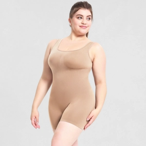 Close-up of nude women's shapewear bodysuit with tummy control and smoothing fabric