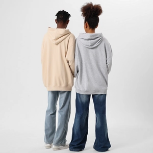 Rear view of oversized beige and grey heavy-knit hoodies with ribbed hem details