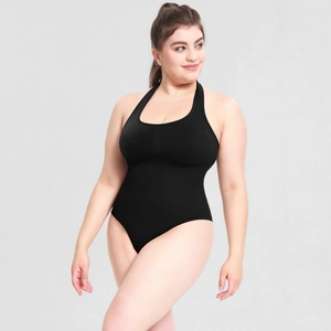 Detail view of the plunging U-neckline on a black plus size halter bodysuit shaper