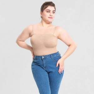 Detail of seamless nude bodysuit shapewear with thin straps and elastic fabric texture