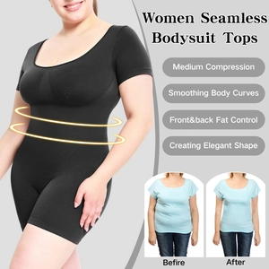 Detail view of black short sleeve seamless shapewear bodysuit with waist compression control