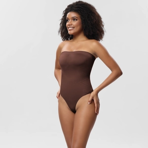 Detail of seamless brown strapless bodysuit featuring tummy control diamond pattern texture