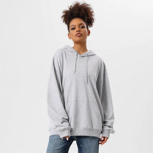 Close-up of heather grey oversized hoodie featuring drawstring hood and kangaroo pocket
