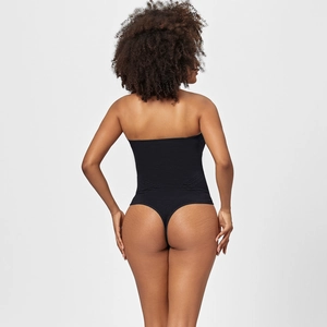 Rear view of black seamless strapless bodysuit thong shaper in high stretch fabric