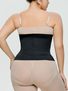 Back view of high elastic black waist trainer showing effective slimming on female model