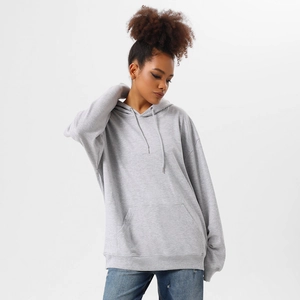 Detail of light gray oversized hoodie with drawstring hood and front kangaroo pocket