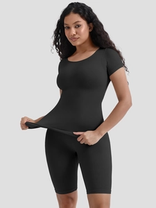 Close-up of black ribbed high-elastic sports set with crew neck top and cycling shorts