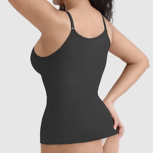 Close-up of seamless black shapewear camisole with adjustable straps and slimming back design