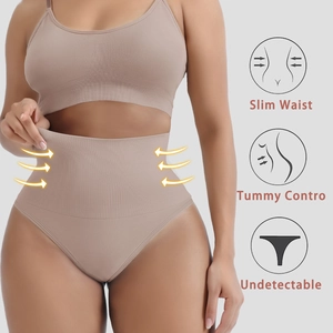 Detail showing high waist tummy control effect on seamless ribbed thong for slim waistline