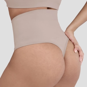 Detailed view of high-waisted seamless thong with ribbed texture and shaping effect