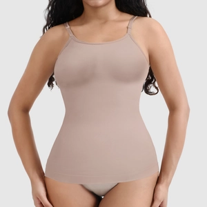 Detail view of seamless nude shapewear vest showing tight fit and elastic compression fabric