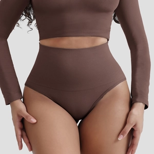 Detail of coffee brown seamless ribbed knit crop top and high waist shaping brief