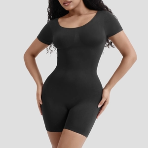Close-up of seamless black short sleeve bodysuit featuring premium ribbed elastic fabric