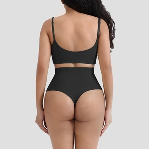 Detail view of black high-waisted shaping lingerie set with a thong and ribbed tummy control
