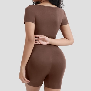 Macro shot of dark brown ribbed seamless shaping jumpsuit with texture detail