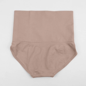 Detail view of seamless high waist tummy control thong in nude skin tone color