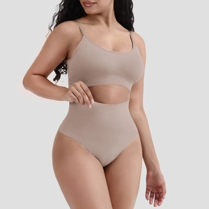 Detail of light brown ribbed knit lingerie set featuring thin straps and high waist panty