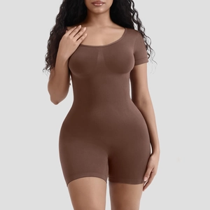 Detail of dark brown short sleeve bodysuit featuring seamless ribbed fabric and scoop neck