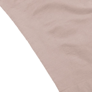 Close-up of pink breathable mesh fabric showing fine knitted texture of body shaper