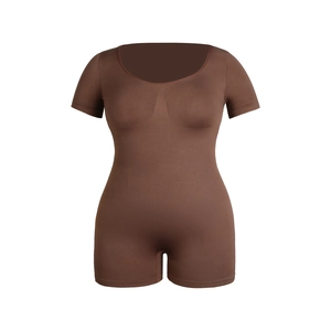 Detail of seamless dark brown body-shaping jumpsuit with ribbed waist support texture