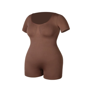 Detail view of seamless dark brown short sleeve bodysuit with compression zones