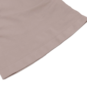 Close-up of lilac knitted mesh fabric with detailed stitching on a slimming vest
