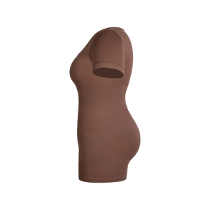 Detail view of brown short sleeve bodysuit with specialized waist and hip compression textures