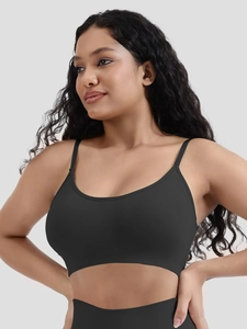 Close-up of black seamless wireless bralette with elastic straps and U-shaped neckline
