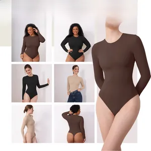 Detail view of double-layered long sleeve bodysuits in brown, black, and beige colors