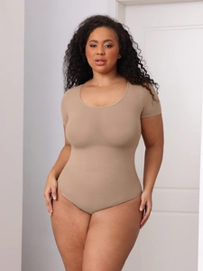 Detailed view of the nude crewneck short sleeve shapewear bodysuit with seamless fabric