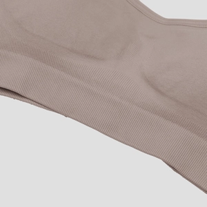 Close-up of seamless knitted bra fabric with a wide ribbed elastic band for comfort