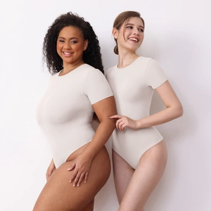Inclusive short sleeve round neck beige bodysuit showing standard and plus size fit