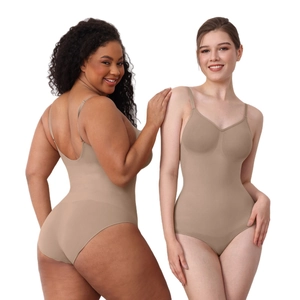 Seamless high compression bodysuit in beige featuring adjustable spaghetti straps and V-neckline