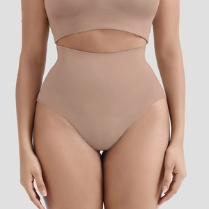 Detail of high waist seamless shapewear with ribbed texture for tummy control and body sculpting