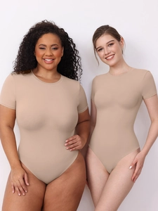 Short sleeve nude bodysuit showing slim fit design and stretchy fabric on models