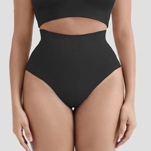 Detail of high waisted black shaping panties set with seamless ribbed compression fabric