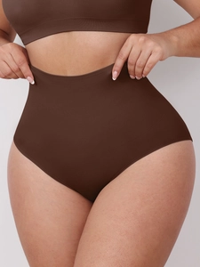 Detailed close-up of high-waisted seamless shaping panties in coffee brown elastic fabric