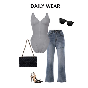 Flachbild eines grauen nahtlosen Shapewear-Bodys kombiniert mit Jeans und Accessoires