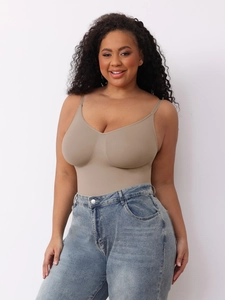 Detail of light brown seamless shapewear bodysuit with V-neck and thin straps