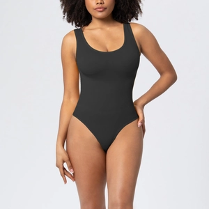 Close-up of black sleeveless bodysuit featuring high-cut design and matte textured fabric