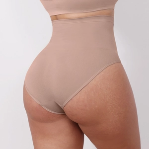 Seamless high waisted tummy control shapewear panty in nude color for body sculpting